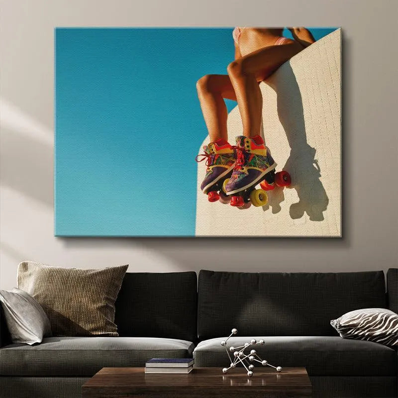 Detailed angle showing the texture of the white wall contrasting with the vibrant skates at Venice Boardwalk.